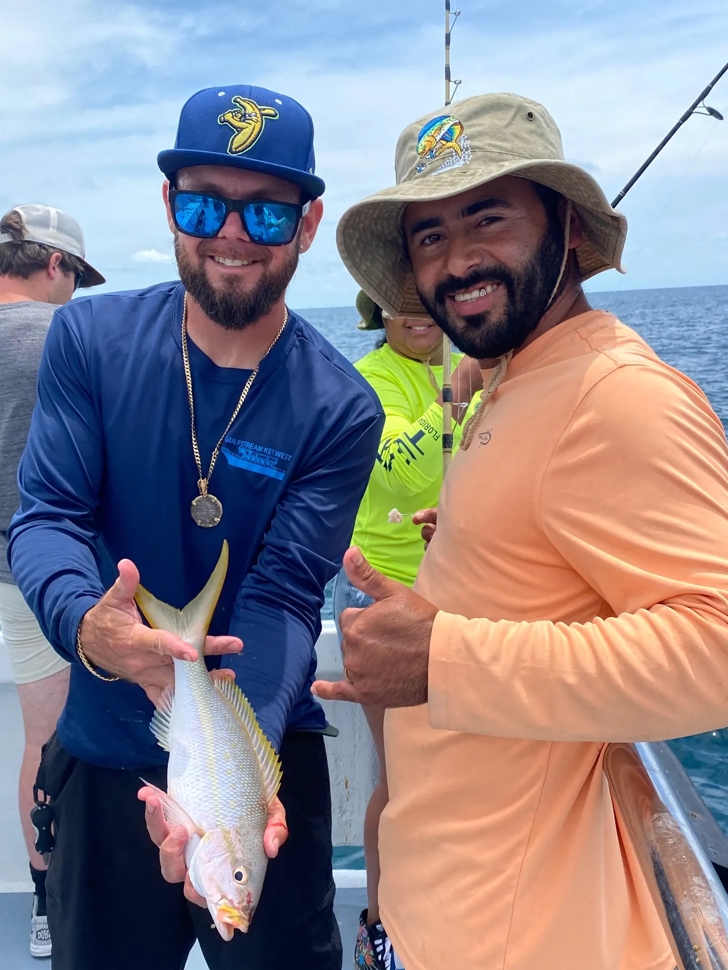 Happy fisherman with catch on Key West party boat